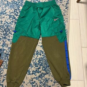 Nike Kids Green and Olive Joggers with Blue Accents